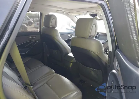 2014 Hyundai Santa Fe Sport 2.4L z USA, uszkodzony, nr VIN 5XYZUDLB8EG231293